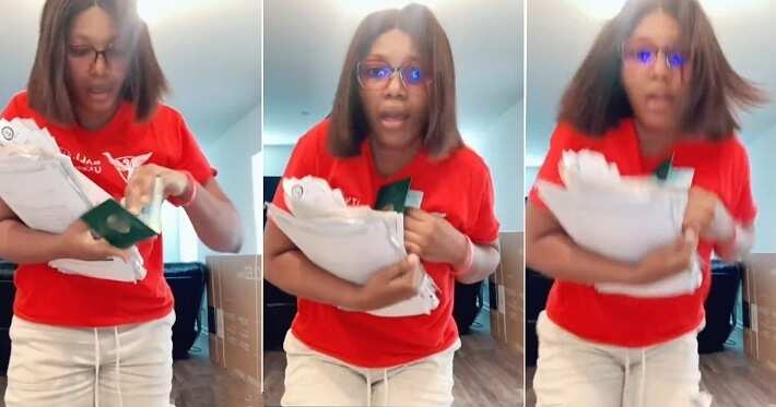 Lady bursts into uncontrollable tears, flaunts her passport in video: "I finally got my US visa"