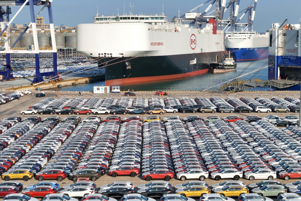 Electric cars waiting to be loaded onto a vessel in China to be transported