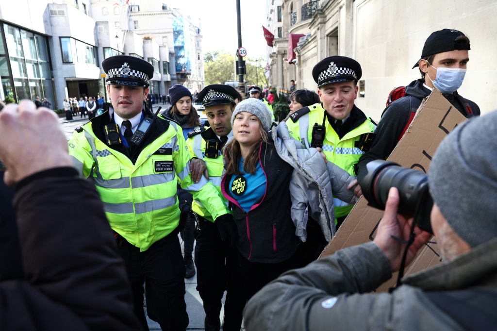 Swedish climate activist Greta Thunberg denounced 'spineless politicians' as she participated in a London protest