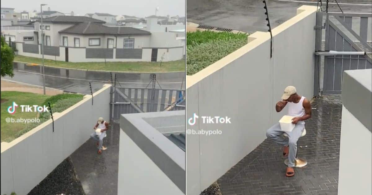 Man sadly eats icecream in the rain, netizens concerned since he lives in a plush neighbourhood
