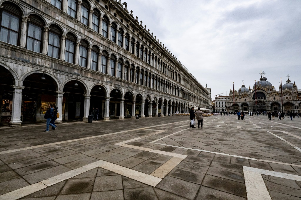 Architect David Chipperfield oversaw renovation of the 500-year-old Renaissance masterpiece the Procuratie Vecchie (L), an iconic building on Venice's Piazza San Marco