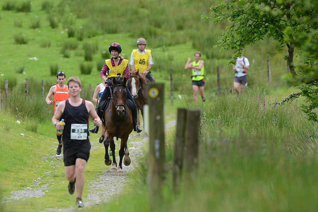 Runners and riders compete in the Man v Horse Marathon in Llanwrtyd Wells, Wales.