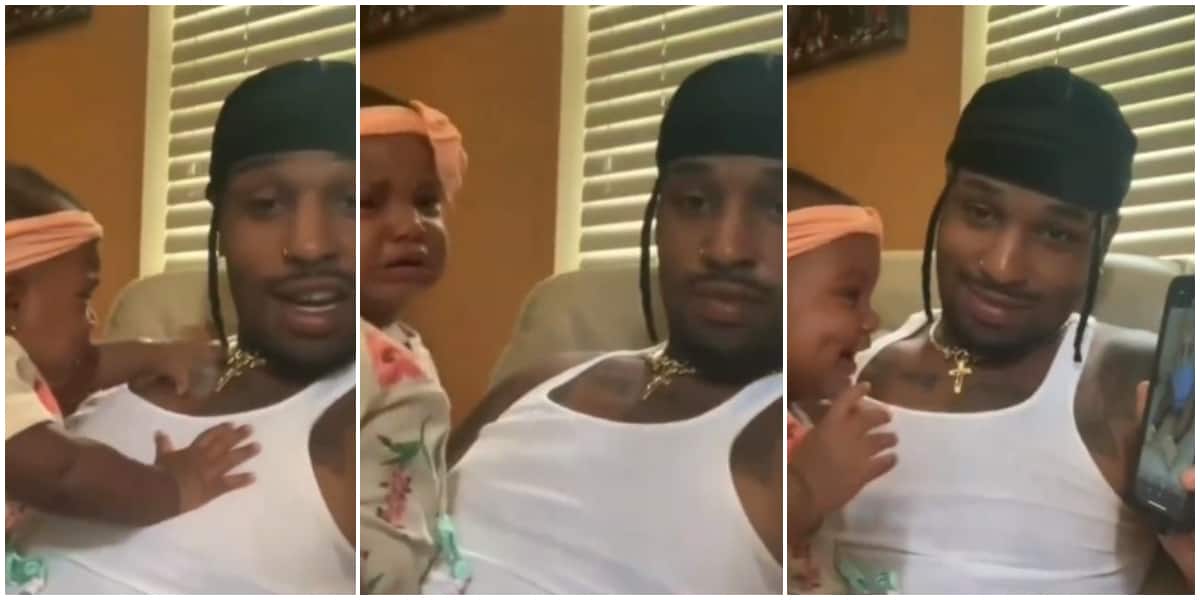 Reactions as baby stops crying and blushes as she watches her own video