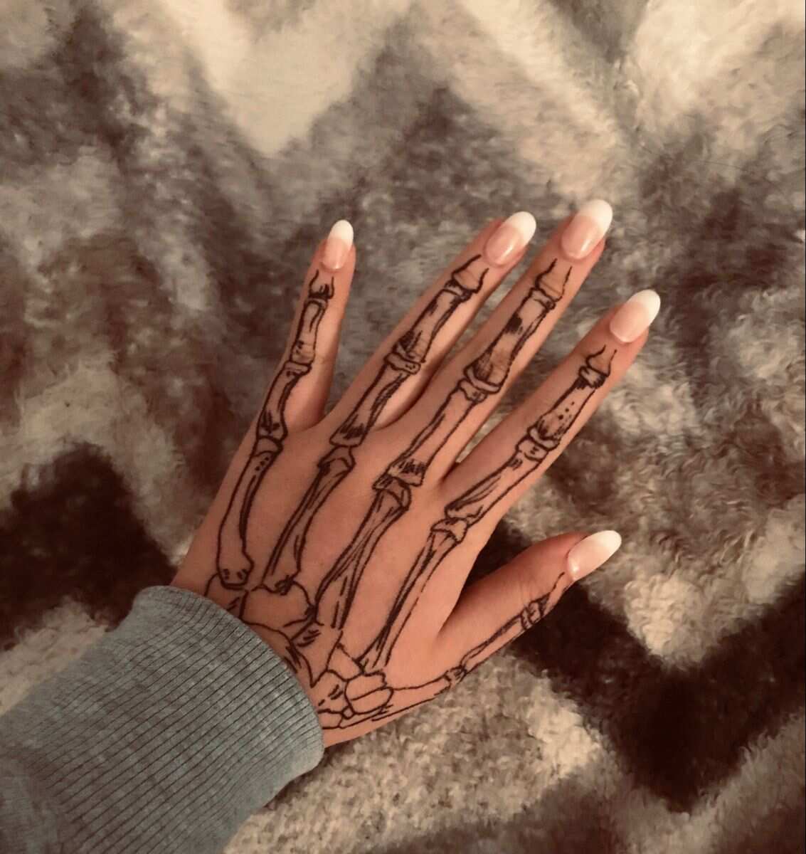 18 Terrifying and Cool Skeleton Hand Tattoos Design  Psycho Tats