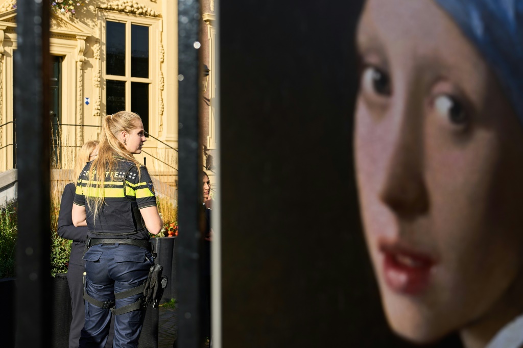 Dutch police arrested three people after climate activists targeted "Girl with a Pearl Earring"