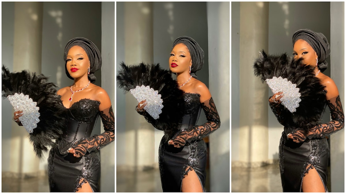 Nigerian tailor designs gown that comes with hand fan
