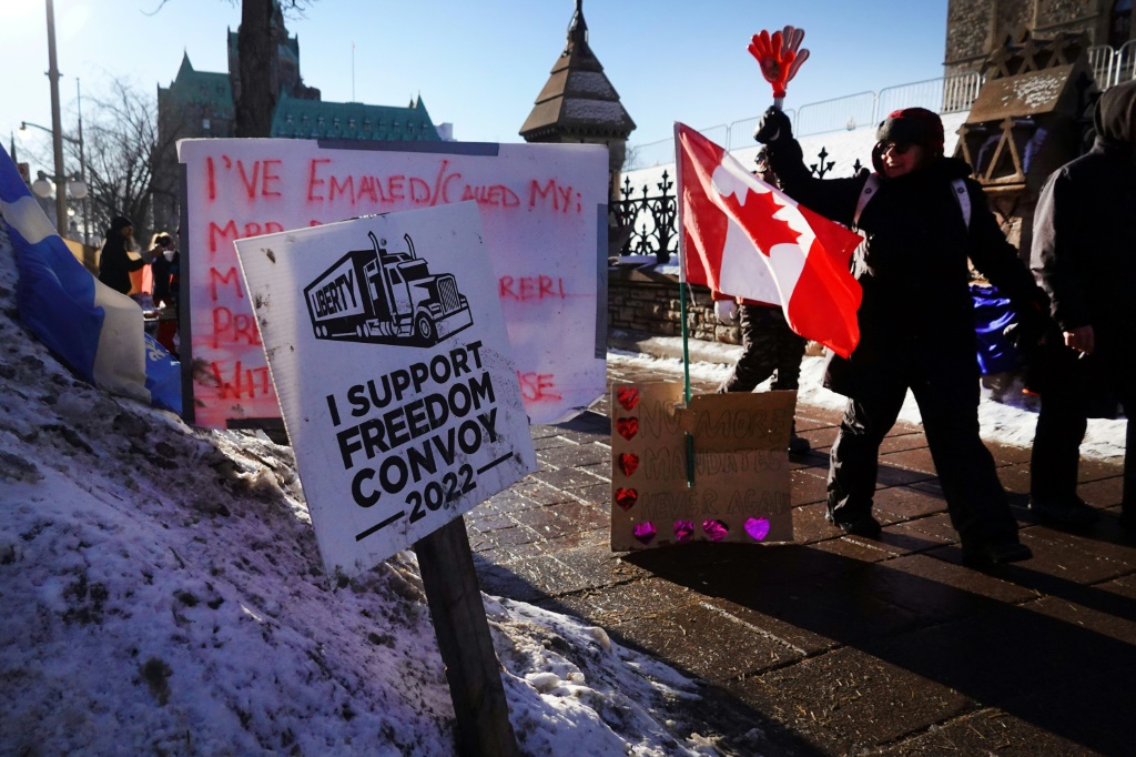 Truck drivers and their "Freedom Convoy" supporters block streets during an anti vaccine mandate protest near the Parliament Buildings on February 15, 2022 in Ottawa, Canada