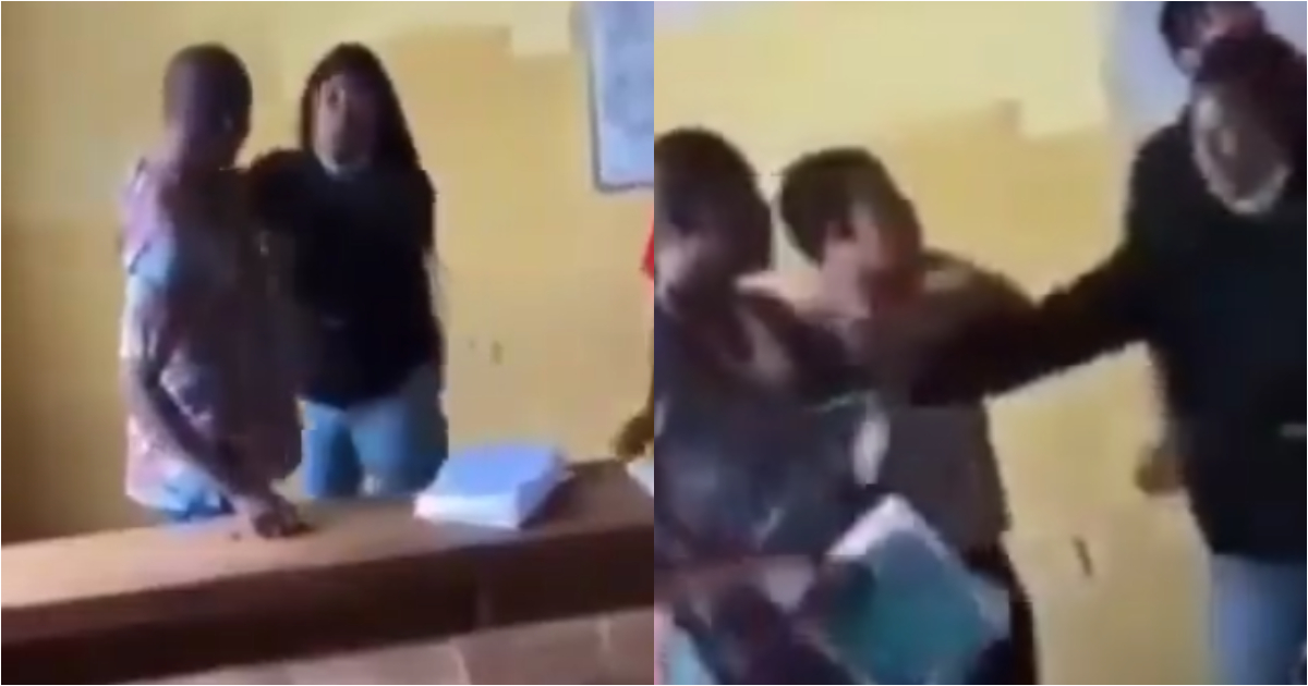 Video emerges as student boldly tears lecturer's shirt as she fights him for stopping her from writing exams
