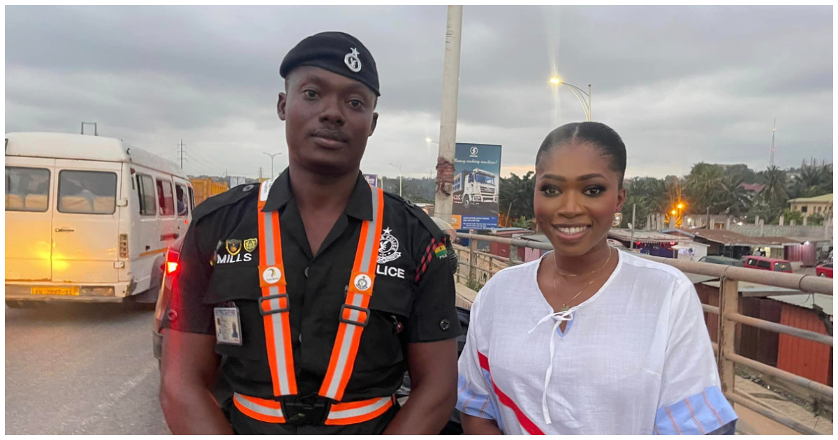 Esinam Seade gets helped by Ghanaian police officer