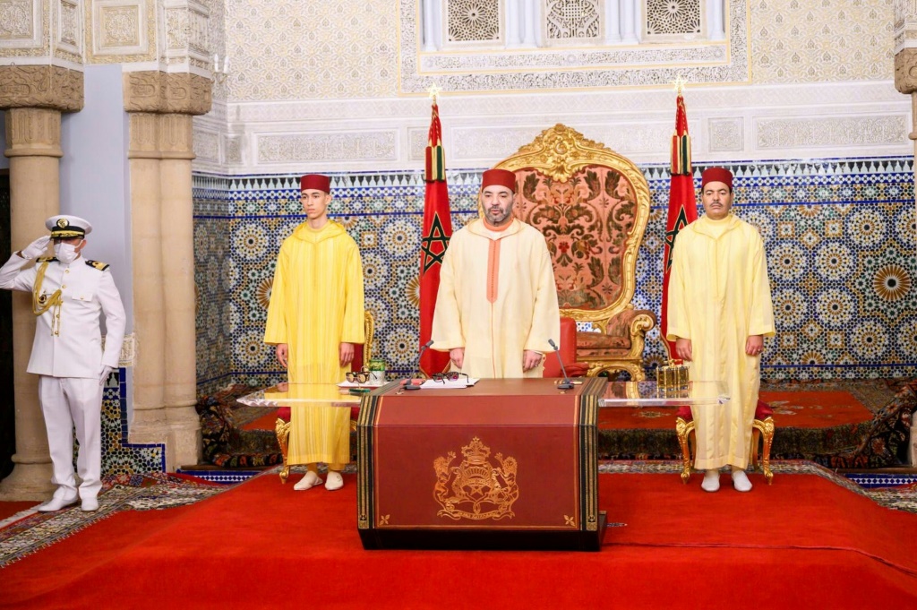 This handout picture released by the Moroccan National Press Agency shows Moroccan King Mohammed VI, flanked by his brother brother Prince Moulay Rachid and son Crown Prince Moulay Hassan