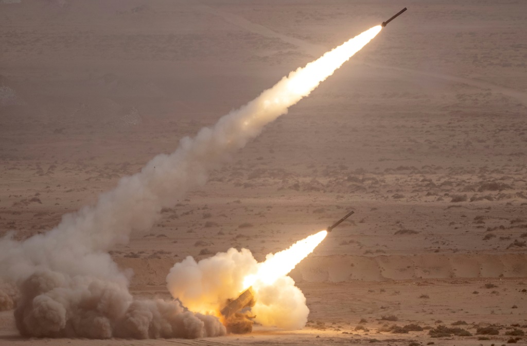 A US M142 High Mobility Artillery Rocket System (HIMARS) fires salvoes: the games were attended by military observers from NATO, the African Union and nearly 30 "partner countries"