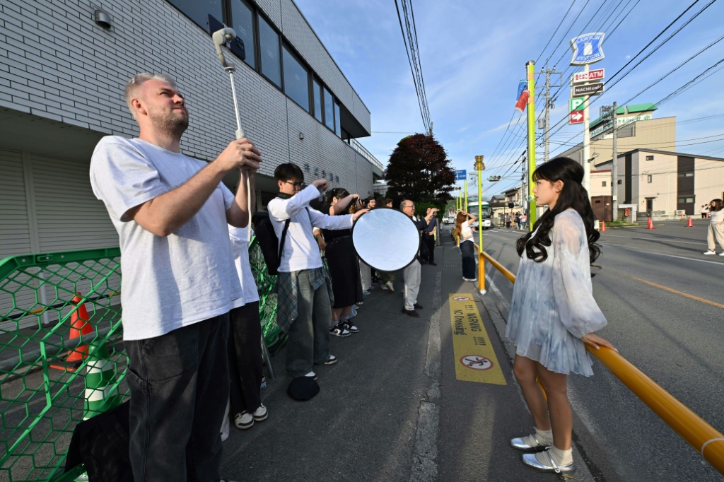 Fujikawaguchiko locals are fed up with streams of visitors littering, trespassing and breaking traffic rules in their hunt for a photo to share on social media
