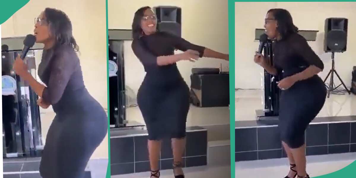 Lady with good shape leads praise and worship.