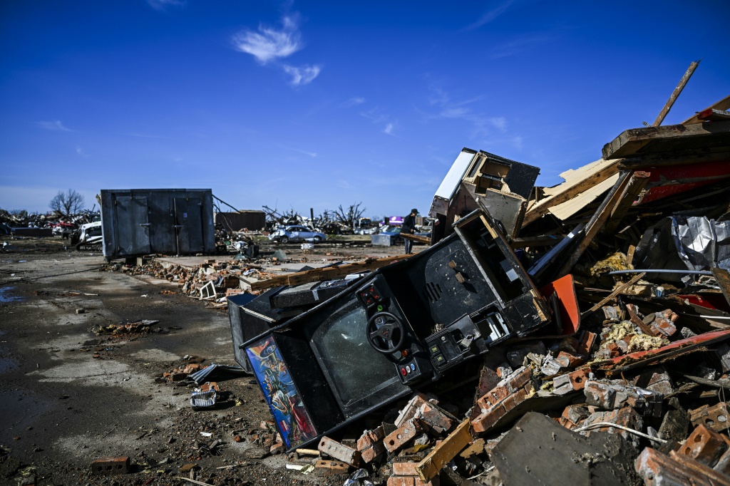 Debris from Chuck's Dairy Bar and other nearby buildings, destroyed in a tornado, are seen in Rolling Fork, Mississippi