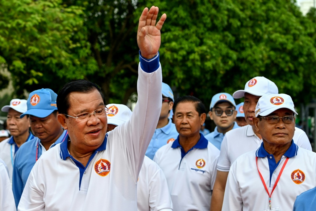 Prime Minister Hun Sen backed down from threats to block Facebook, but said its representatives would not be welcome in Cambodia
