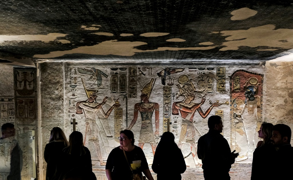 Visitors tour the tomb of Ramses III (1186-1155 BC) in Valley of the Kings at of Luxor