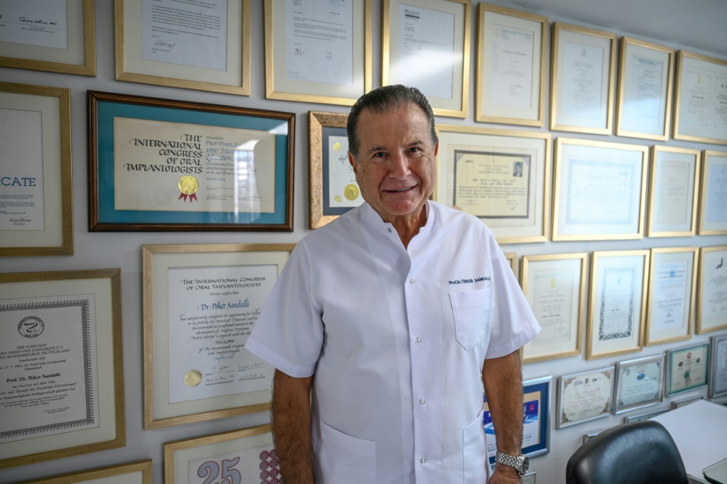 'Turkish dentists are the best and the cheapest in the world,' says dentist Turker Sandalli