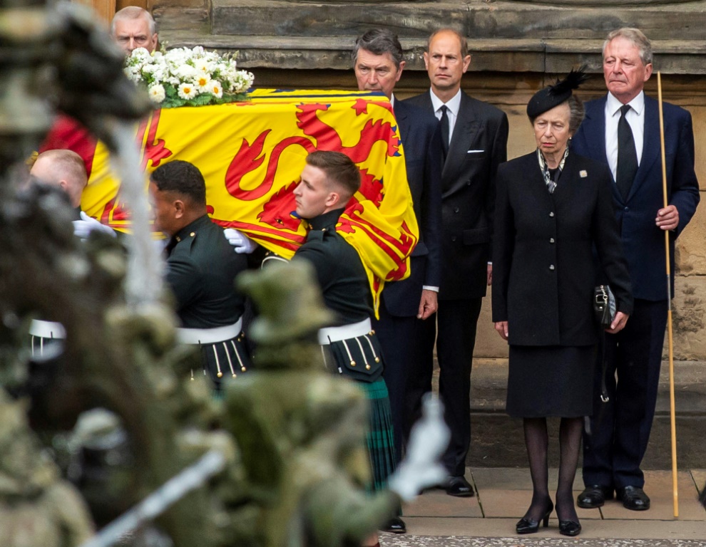 The coffin carrying the body of Queen Elizabeth II arrives at the Palace of Holyroodhouse, Edinburgh