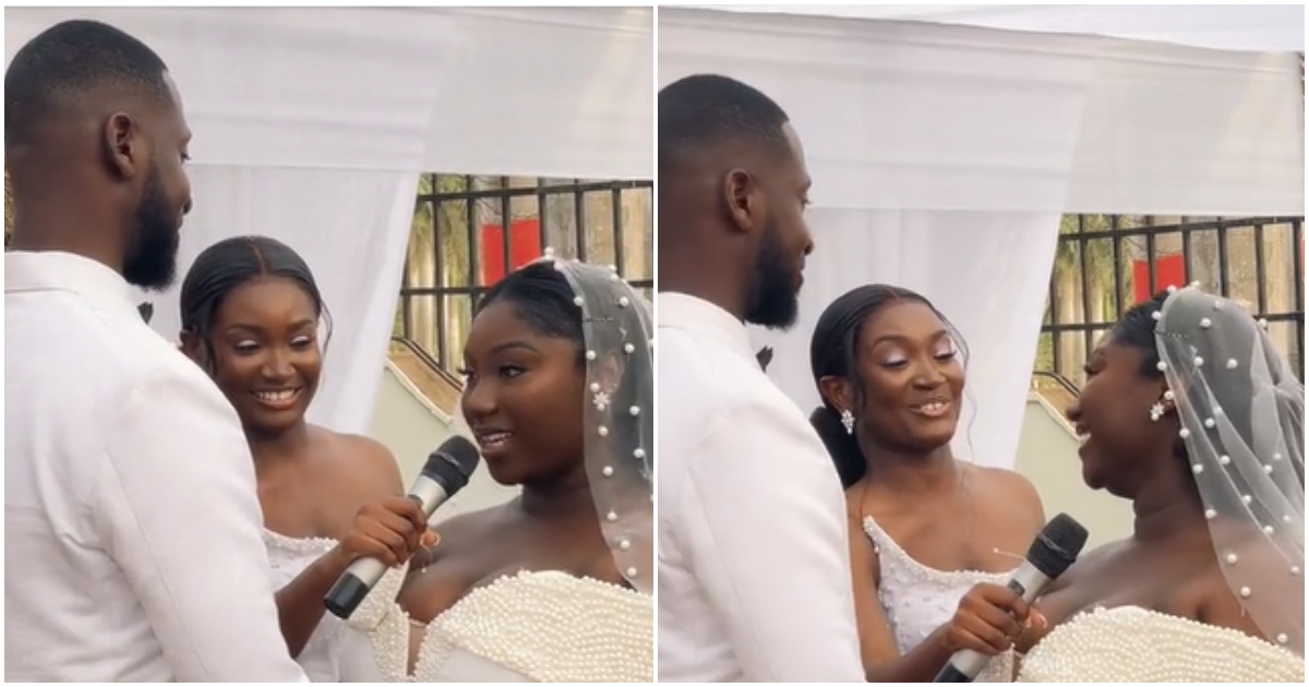 Young couple exchange wedding vows on the altar