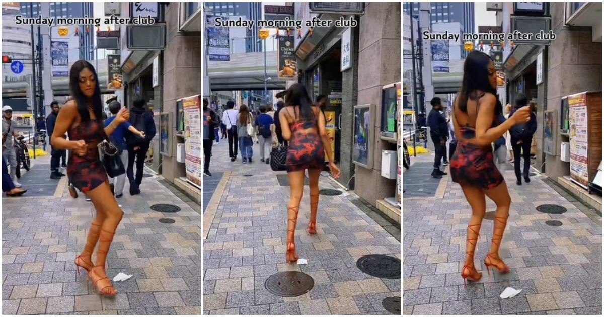 Tall beautiful lady in heels, lady in short dress dances, shakes waist on Japan street