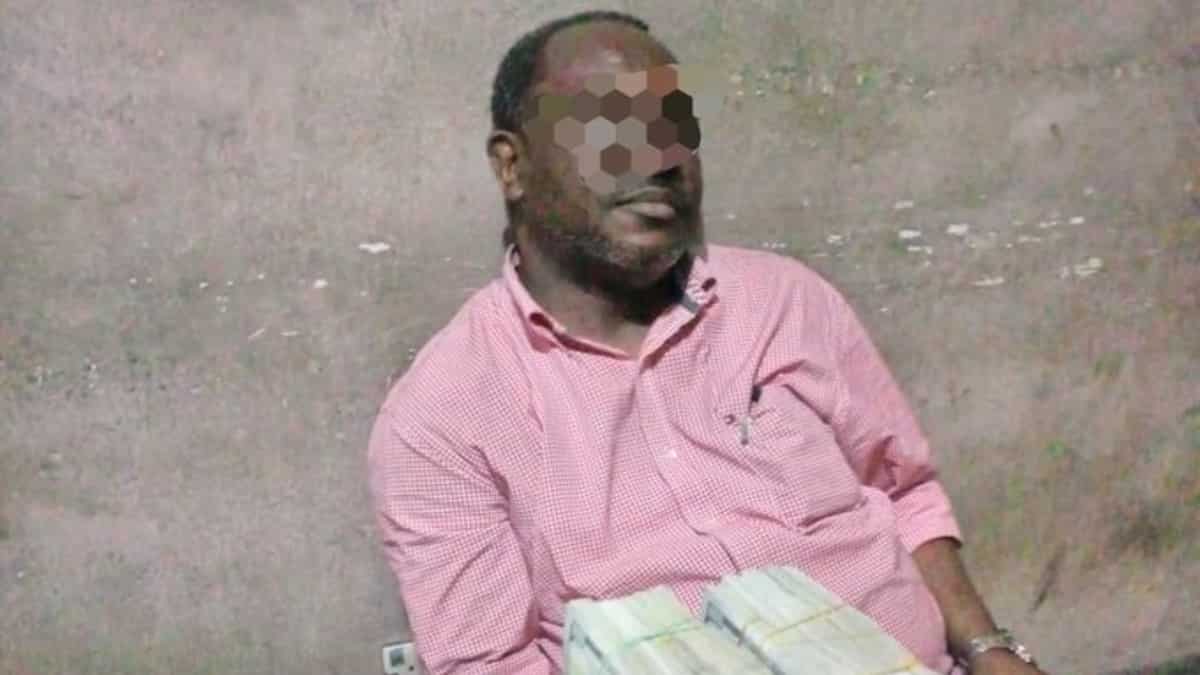 Photo, details emerge as police arrest Nigerian prominent House of Reps member with bag containing $498k