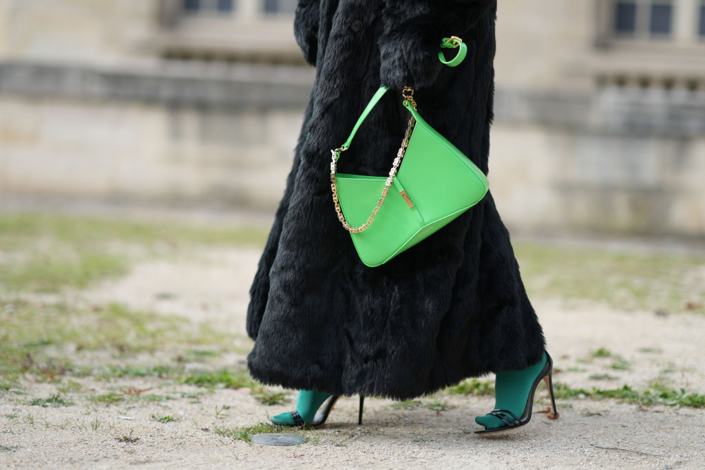 A green Givenchy bag is seen during the Paris Fashion Week in Paris, France.