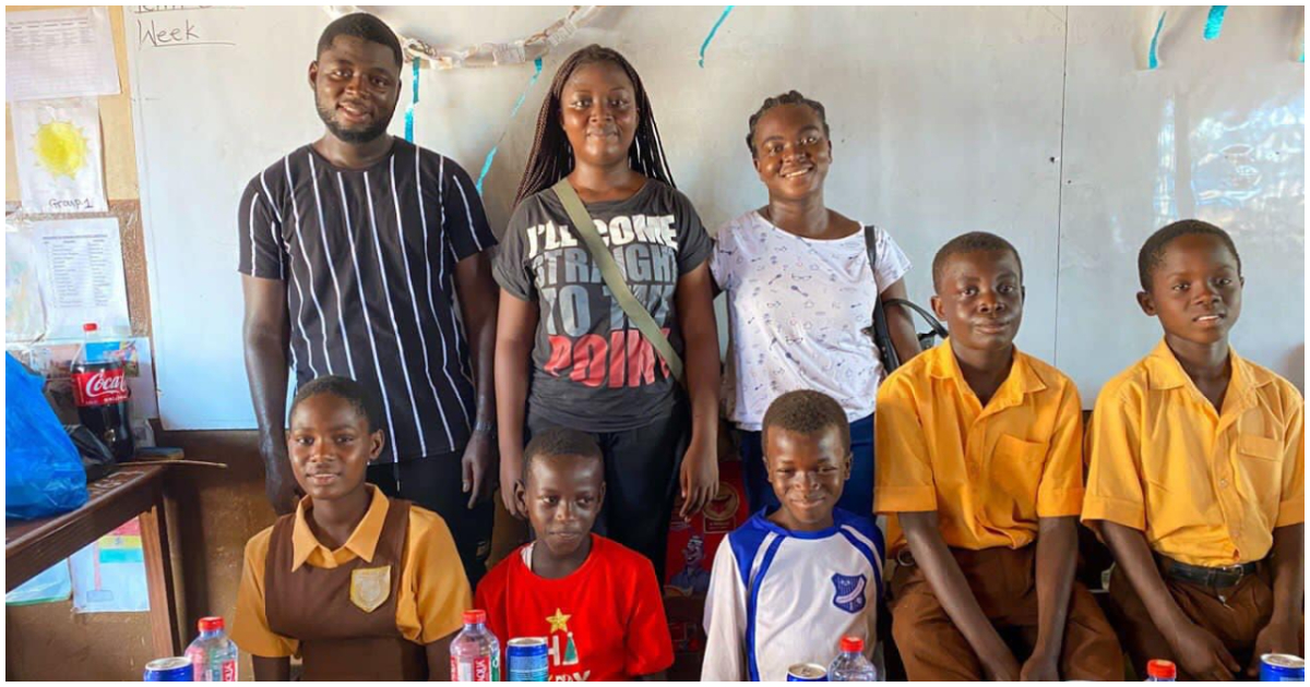 Some members of FTF Ghana pose with some beneficiaries of their NGO