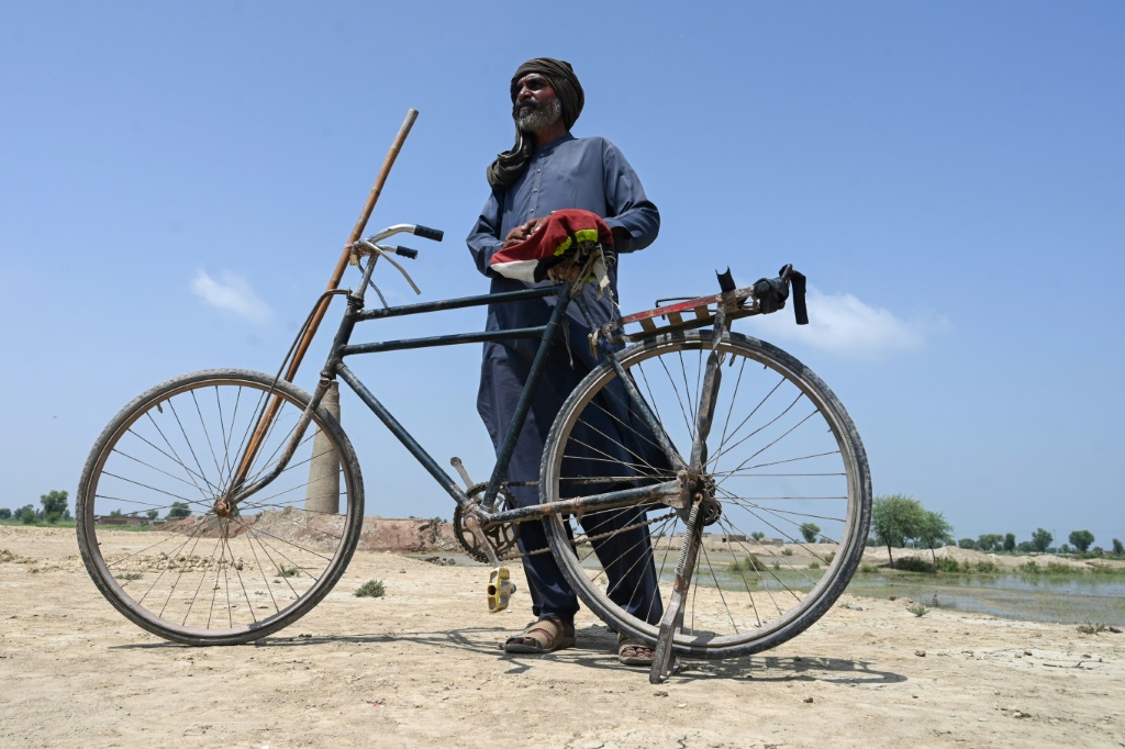 Labourer Muhammad Ayub cycles to the kiln every day in the hope that its furnaces may have been fired up again and he can resume work