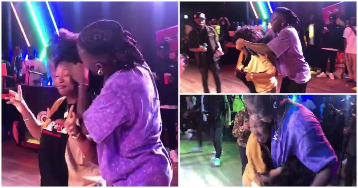 Stonebwoy and a die-hard fan on stage