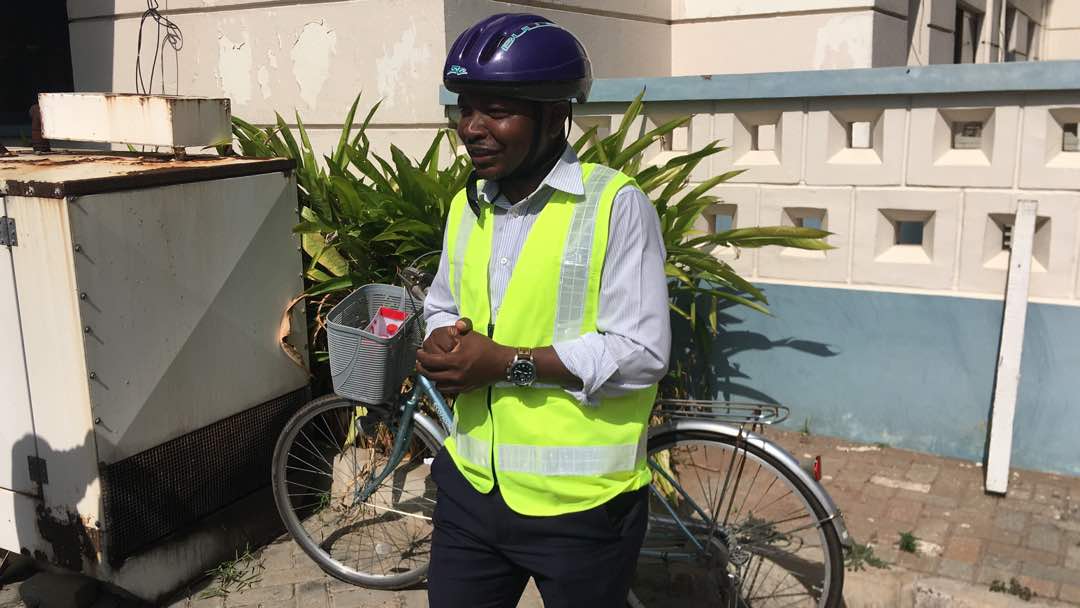 NDC MP storms Parliament on bicycle