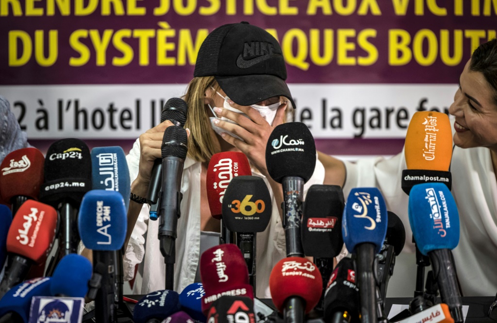 An accuser reacts during a news conference organised by the Moroccan Association for the Rights of Victims (AMDV) in Tangiers in northern Morocco on June 17