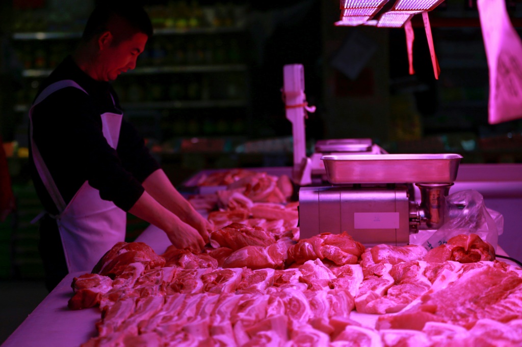 A surge in pork prices has kept China's consumer inflation at a two-year high