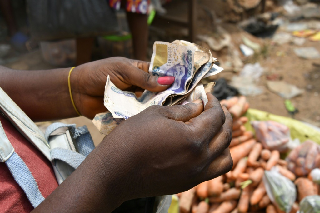 Nigeria's cash shortage eases after strike threat