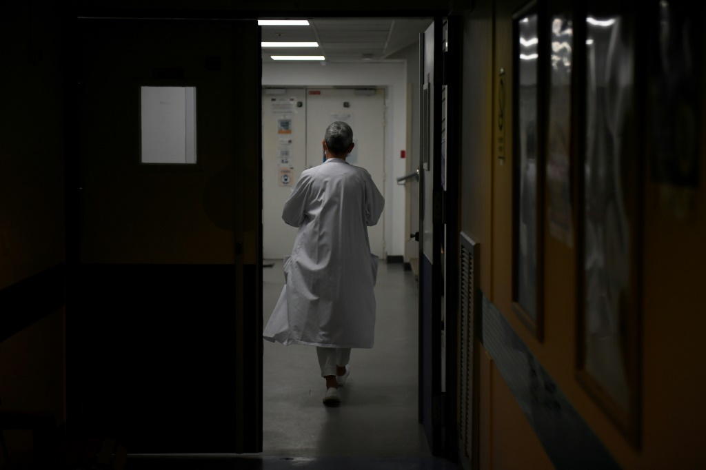 A medical employee walks in a corridor of a Monkeypox vaccination site in Paris in August 2022