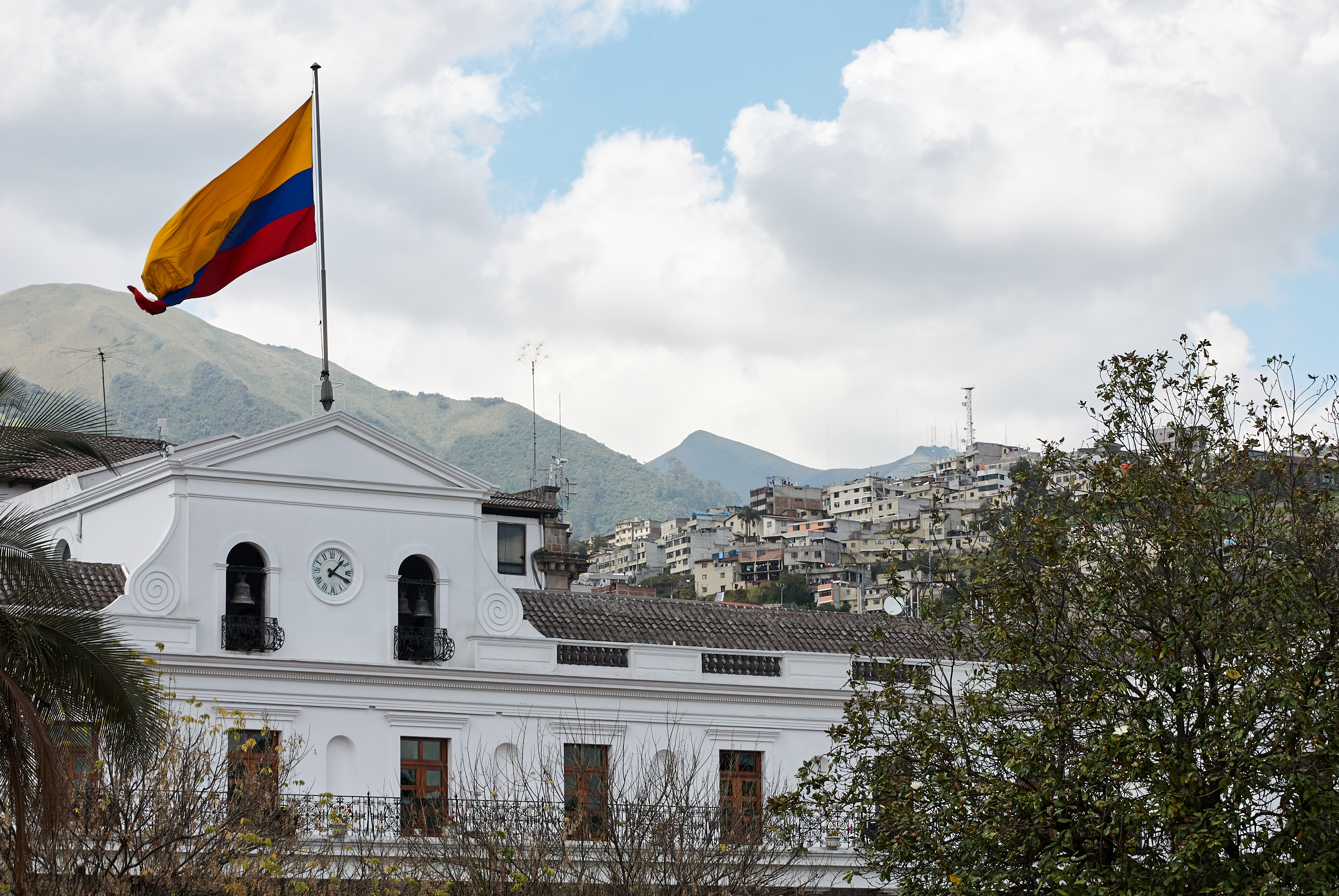 Ecuador's flag on top of a government building