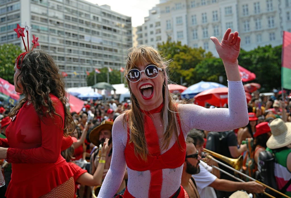 A supporter of president-elect Luiz Inacio Lula da Silva celebrates his election victory during a street carnival in Copacabana, Rio de Janeiro, Brazil, on November 6, 2022