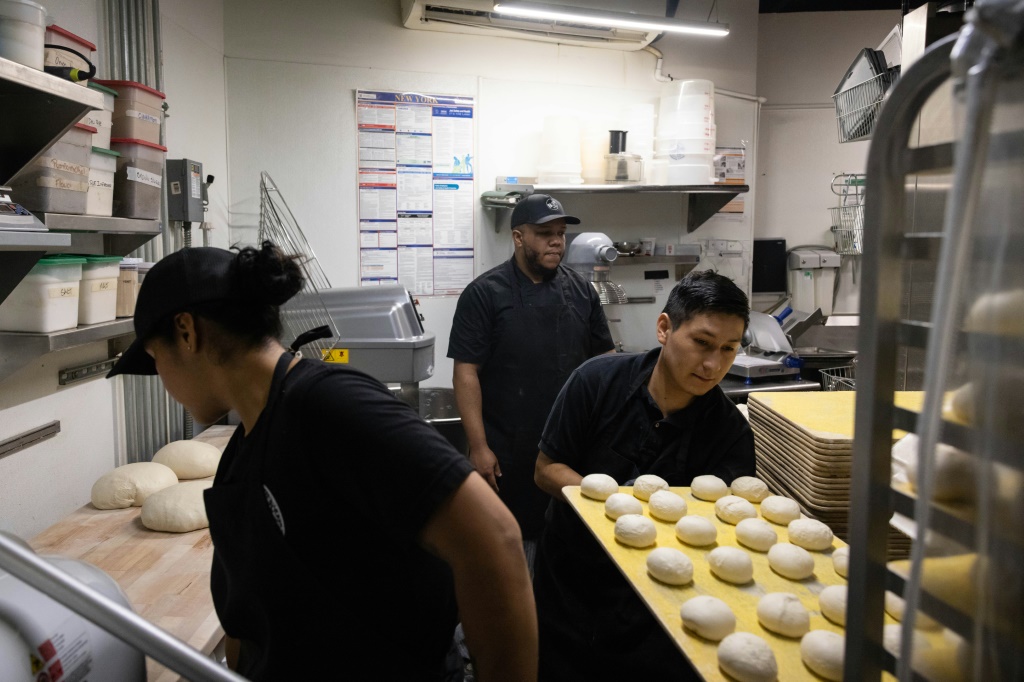 Employees prepare dough balls at Bo's Bagels in New York City