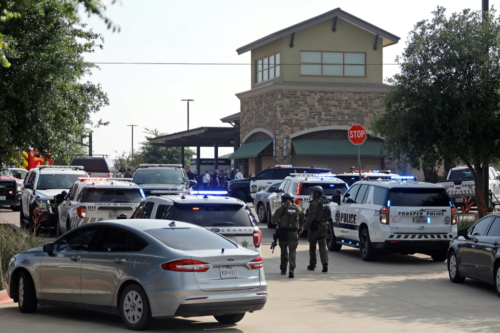Emergency personnel work the scene of a mass shooting at Allen Premium Outlets in Allen, Texas on May 6, 2023.