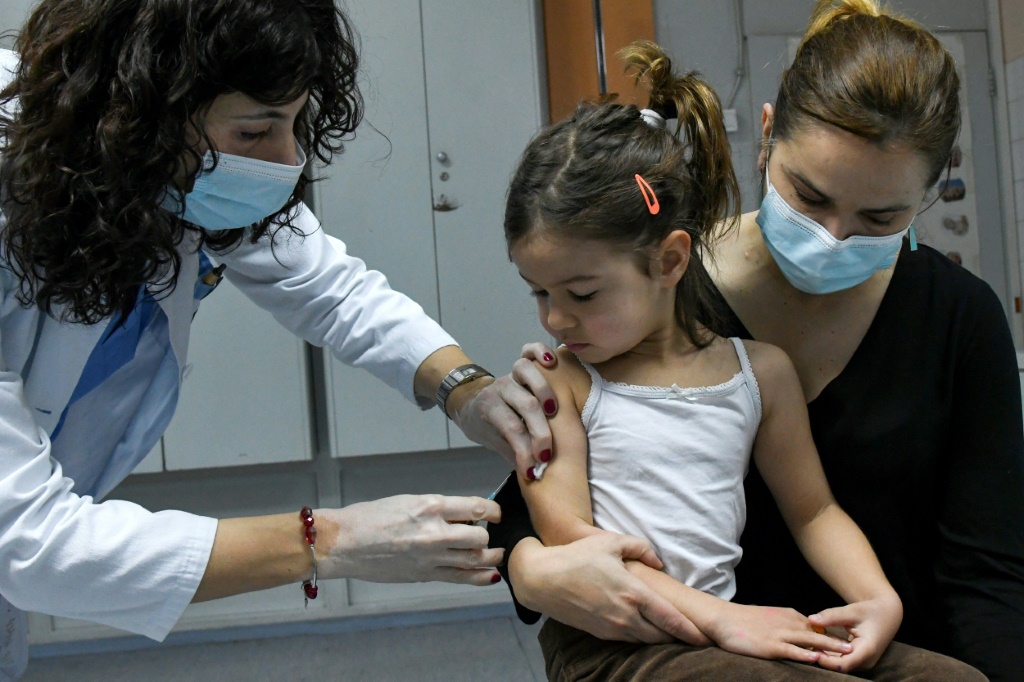 A health worker administers a measles vaccine in Montenegro in 2020. A decline in inoculation rates has been attributed to a range of factors including Covid-19 misinformation