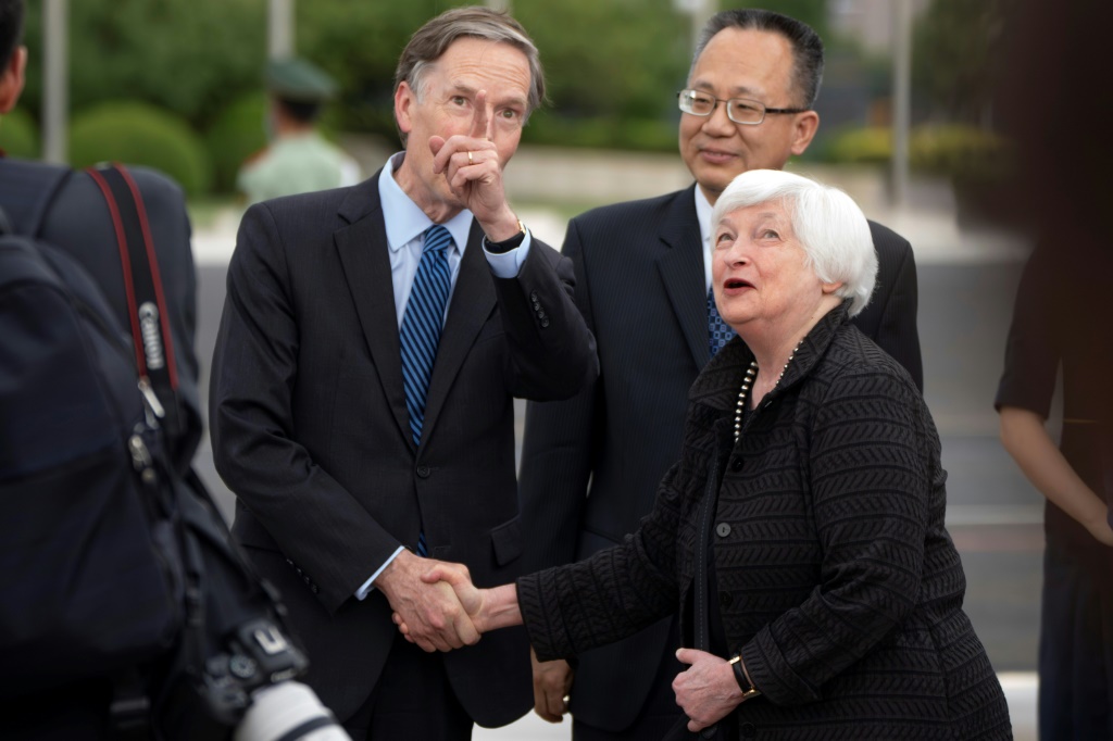 The four-day trip to China by Janet Yellen (R) is her first as US Treasury Secretary