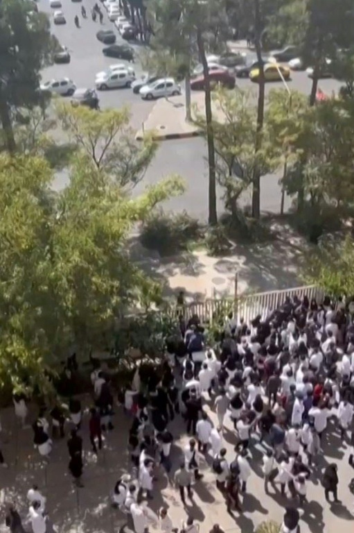 Iranian university students rally in the southern city of Shiraz, in an image from a video made available on the ESN platform on September 29, 2022