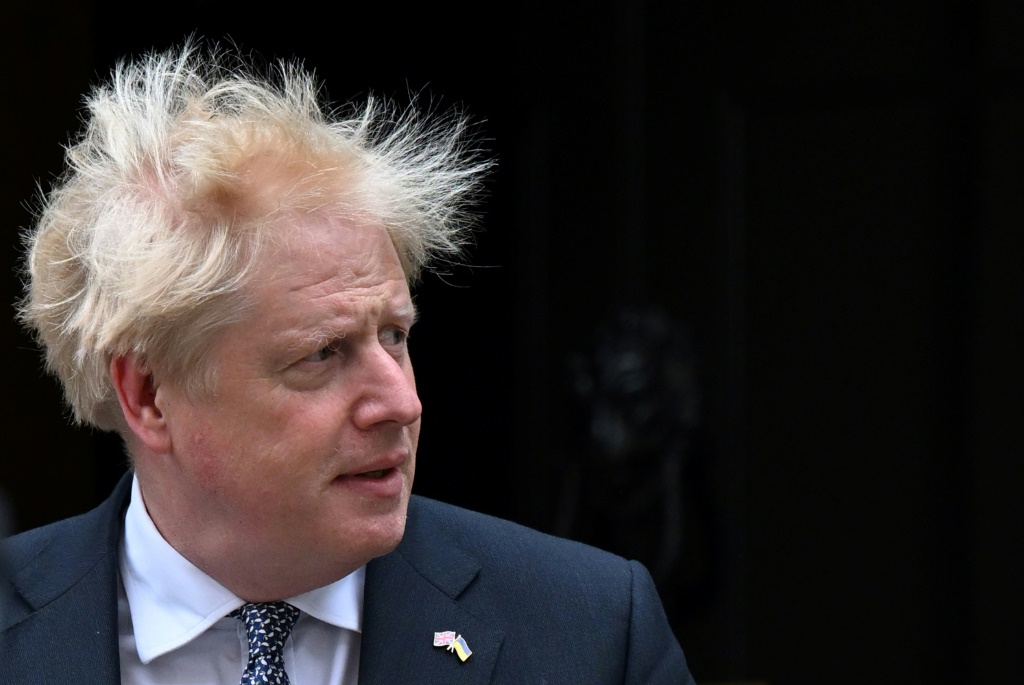 Johnson resigned as leader of Britain's Conservative party but stays on as prime minister until a replacement is found