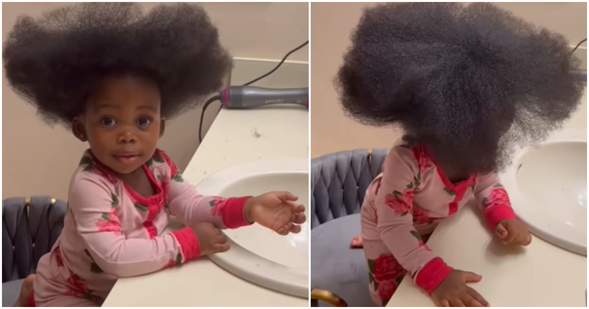 Baby girl flaunts her natural hair.