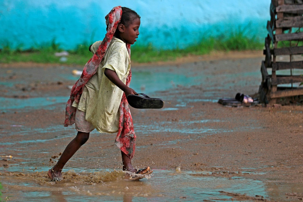 A girl in Sudan's Blue Nile at a camp for displaced people: some 31,000 people from both sides forced to flee their homes