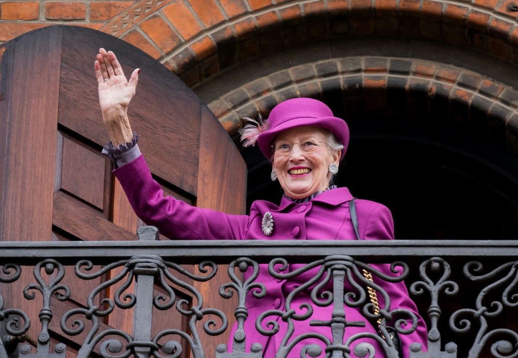 Now Europe's only reigning queen, Queen Margrethe II waved from the city hall balcony