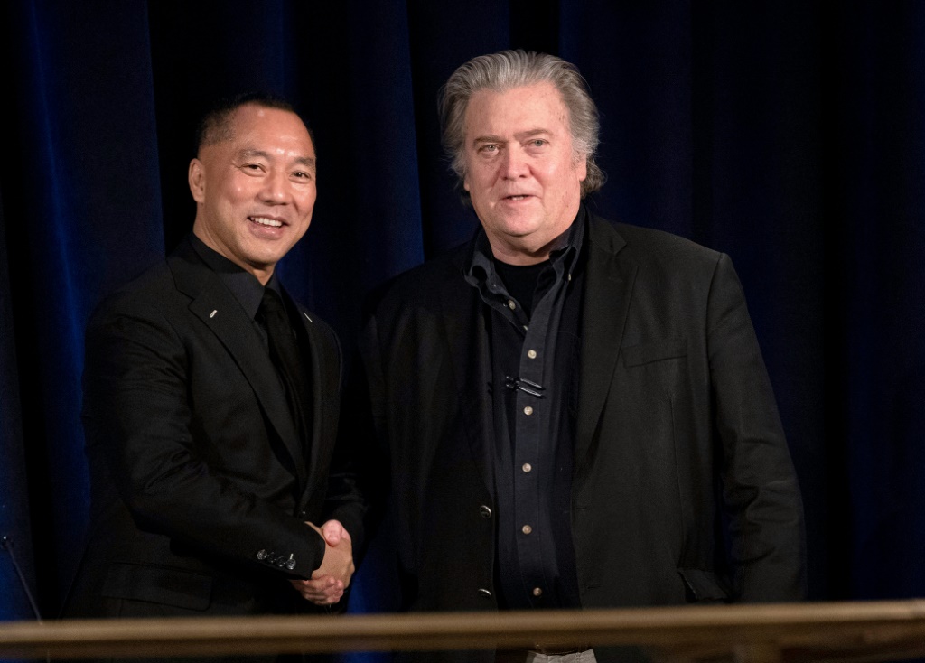 Former White House Chief Strategist Steve Bannon (R) and Chinese tycoon Guo Wengui, who was arrested by US Justice authorities on charges of massive fraud