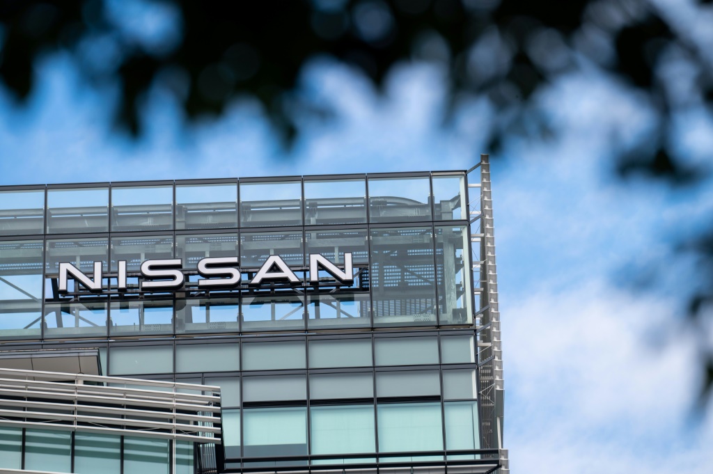 Nissan raised its forecasts as a weaker yen helps inflate its overseas profits