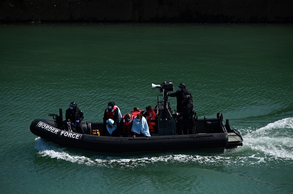Government figures showed that 990 migrants crossed the Channel in small boats on Saturday