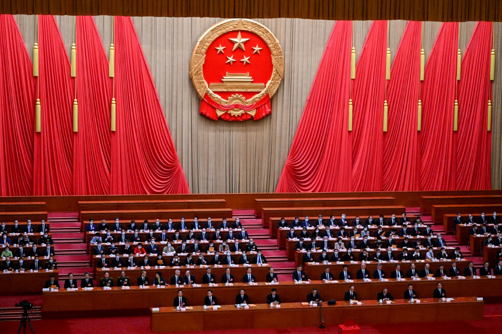 China's rubber-stamp national legislature meets to appoint the country's new cabinet