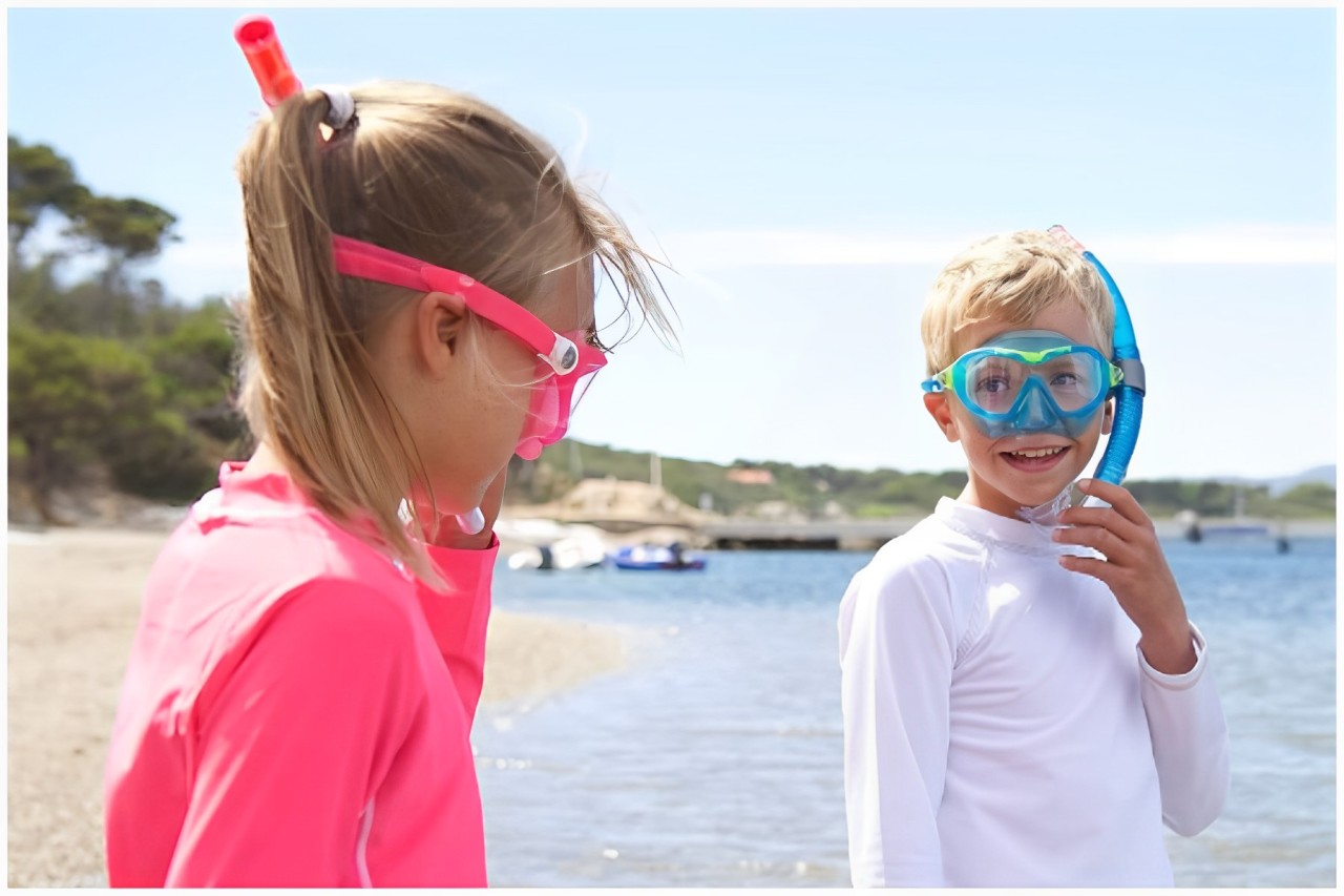 Two kids in snorkeling gear